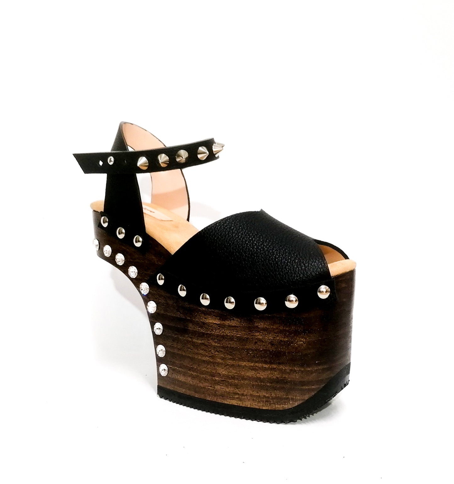 Black leather platform sandal with silver studs. Wooden wedge heel in C decorated with swarovski crystals. Super high heel sandal with genuine swarovski crystals. Super high heel sandal without heel. Sizes 34 to 47. High quality leather shoes handmade by sol Caleyo. Sustainable fashion.