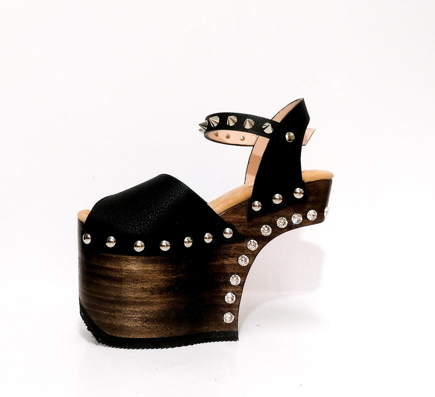 Black leather platform sandal with silver studs. Wooden wedge heel in C decorated with swarovski crystals. Super high heel sandal with genuine swarovski crystals. Super high heel sandal without heel. Sizes 34 to 47. High quality leather shoes handmade by sol Caleyo. Sustainable fashion.