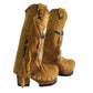 Camel suede cowboy boots. Clogs with hand-painted buffalo head, feathers, and fringes. Bohemian-style boots. High-end footwear handmade by Sol Caleyo.
