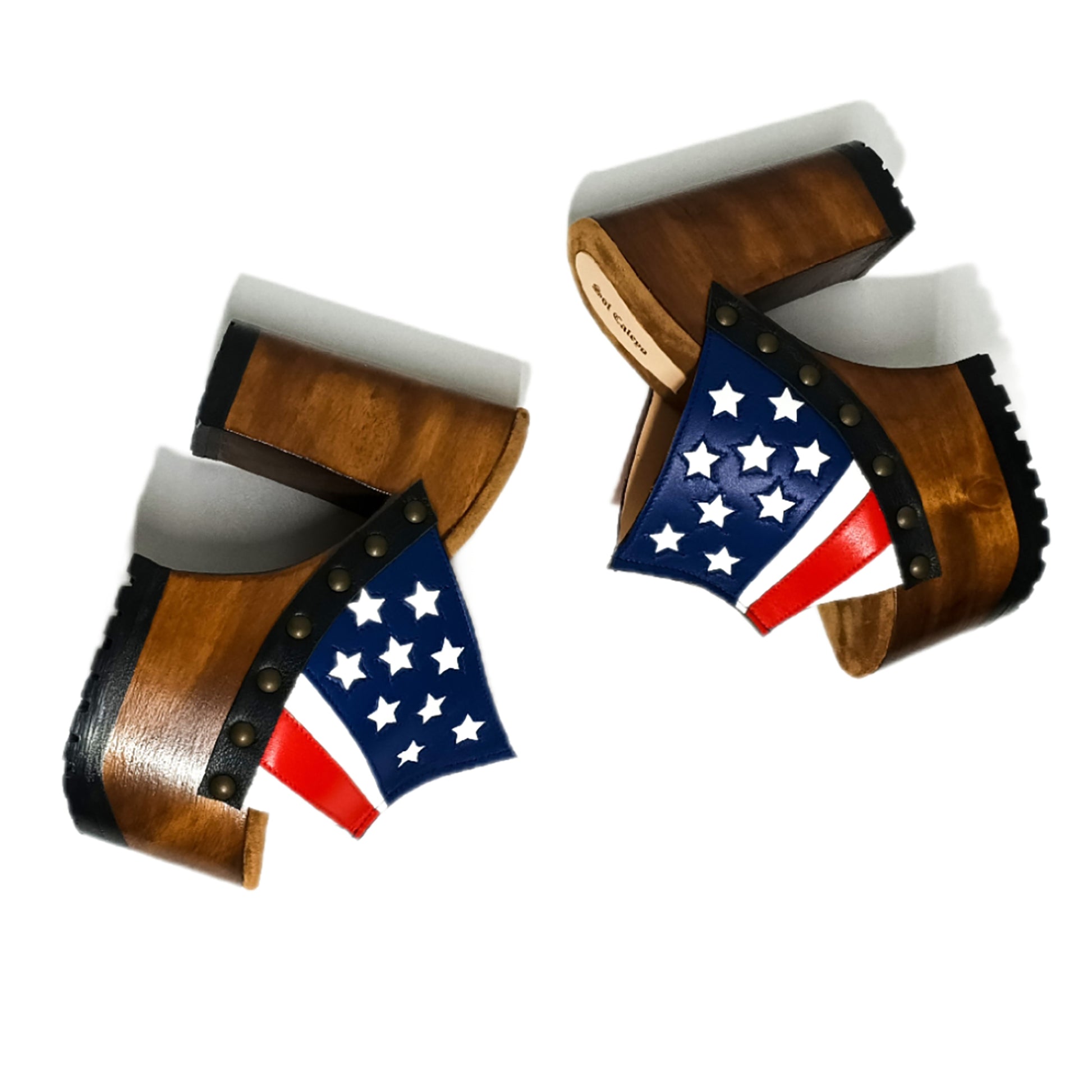 Sandals with a unique American flag design. Vintage-style platform sandals with wooden heels. Heels with a unique American flag design. High-end footwear handmade to order. Exclusive design by Sol Caleyo.