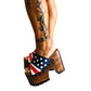 Sandals with a unique American flag design. Vintage-style platform sandals with wooden heels. Heels with a unique American flag design. High-end footwear handmade to order. Exclusive design by Sol Caleyo.