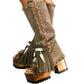 Bohemian-style boots in earth-colored suede leather. Bohemian-style platform boots, decorated with horns, fringes, feathers, and shells. High-end footwear handmade to order. Exclusive design by Sol Caleyo.