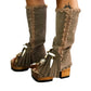 Bohemian-style boots in earth-colored suede leather. Bohemian-style platform boots, decorated with horns, fringes, feathers, and shells. High-end footwear handmade to order. Exclusive design by Sol Caleyo.