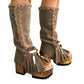 Bohemian-style boots in earth-colored suede leather. Bohemian-style platform boots, decorated with horns, fringes, feathers, and shells. High-end footwear handmade to order. Exclusive design by Sol Caleyo.