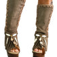 Bohemian-style boots in earth-colored suede leather. Bohemian-style platform boots, decorated with horns, fringes, feathers, and shells. High-end footwear handmade to order. Exclusive design by Sol Caleyo.