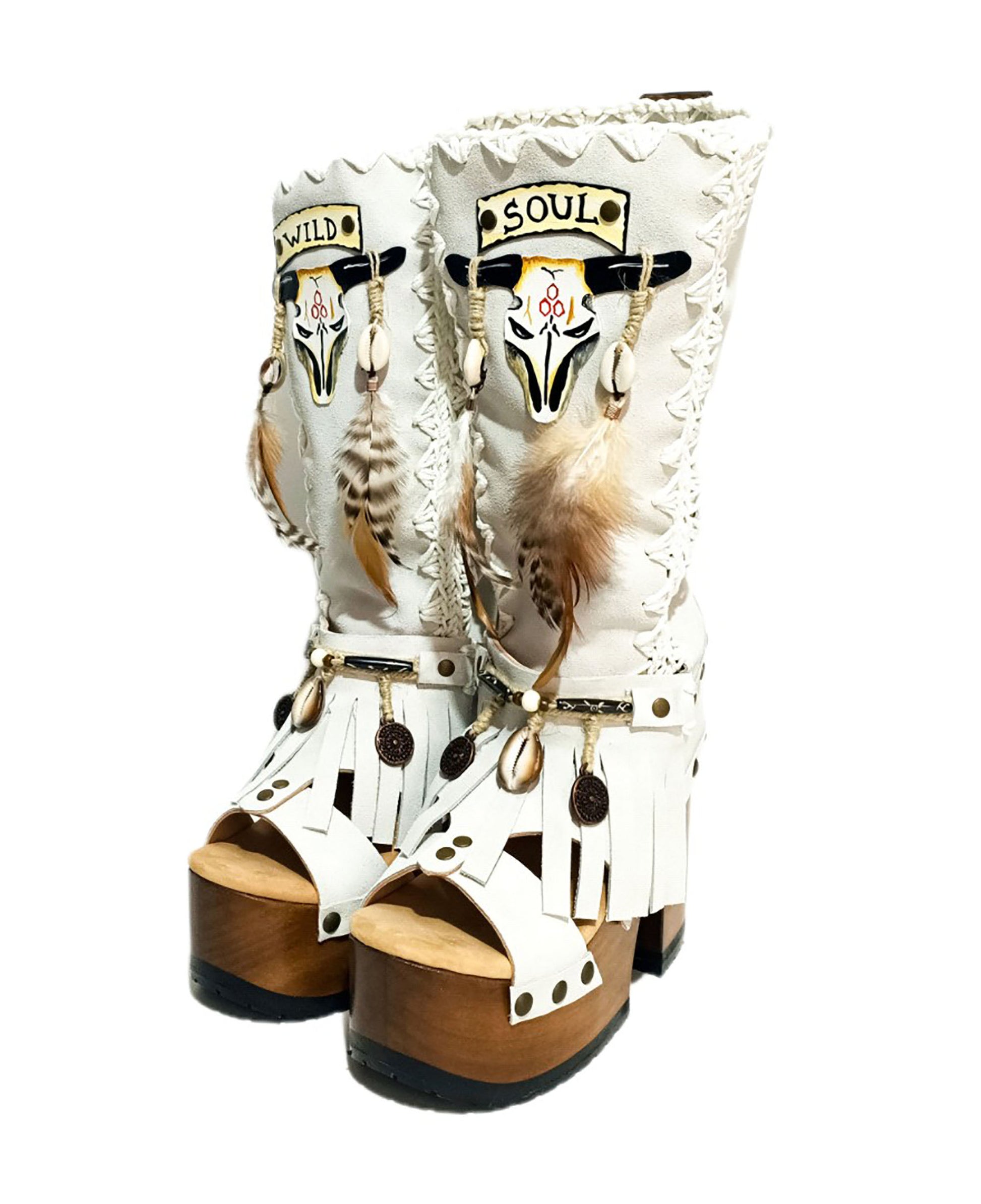 White suede leather platform boots sandals, with hand painted buffalo, decorated with feathers, natural shells, coins and horns, totally handmade to order. An authentic bohemian style boot handmade by Sol Caleyo. Sizes 34 to 47.