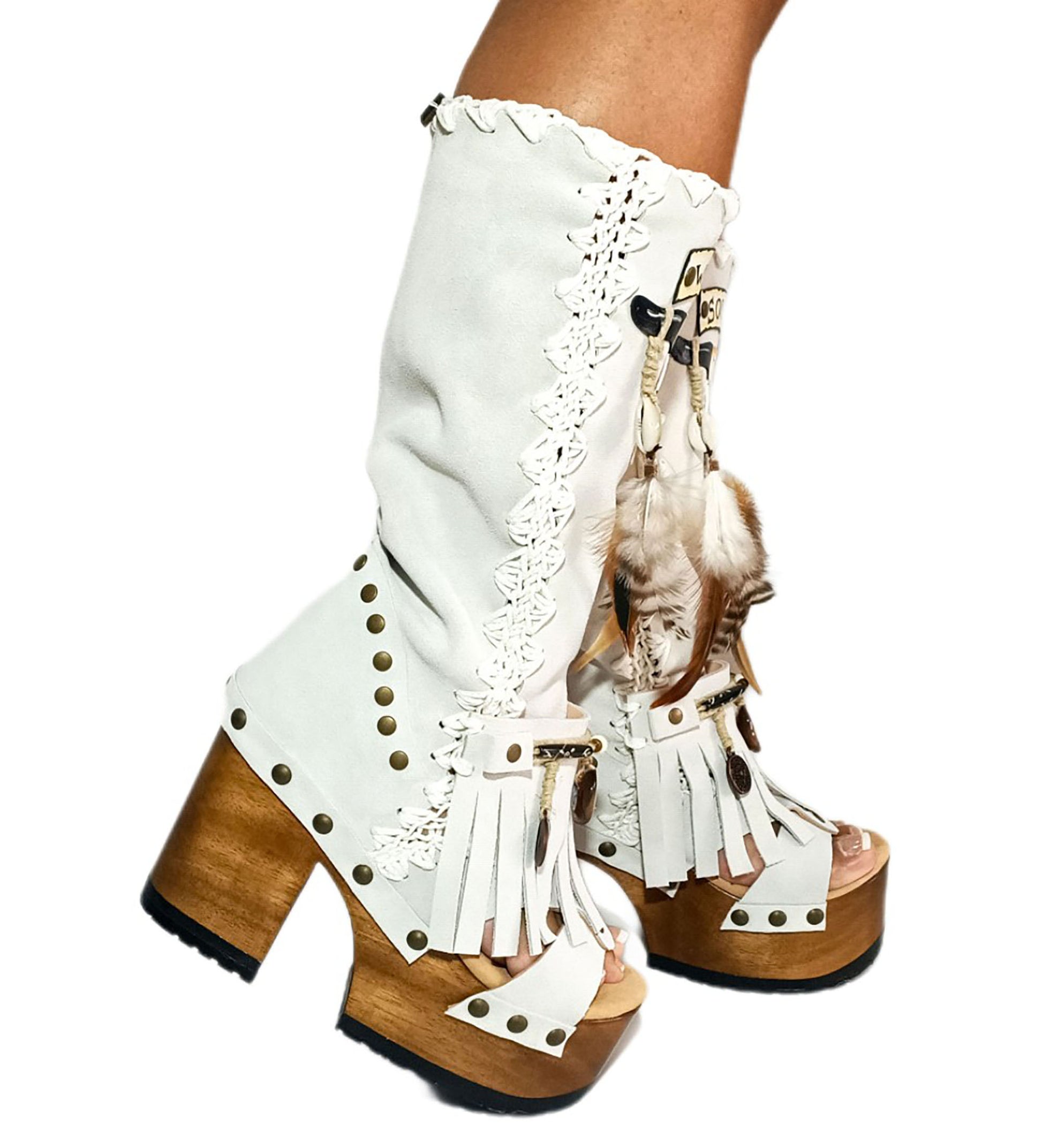 White suede leather platform boots sandals, with hand painted buffalo, decorated with feathers, natural shells, coins and horns, totally handmade to order. An authentic bohemian style boot handmade by Sol Caleyo. Sizes 34 to 47.