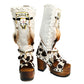 Boots in colt leather with cow print, painted with buffalo head. Platform boots with high wooden heel. Cowboy style boots. High quality leather footwear handmade by Sol Caleyo. 