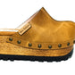 Aged camel handmade leather wedge mule clogs with antique-gold studs and 7 cm wooden wedge by Sol Caleyo.