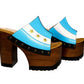 Pair of Sol Caleyo Argentina Sandals featuring a handcrafted wooden block heel and platform, a blue and white leather strap designed as the Argentine flag with three gold stars, and antique gold studs.