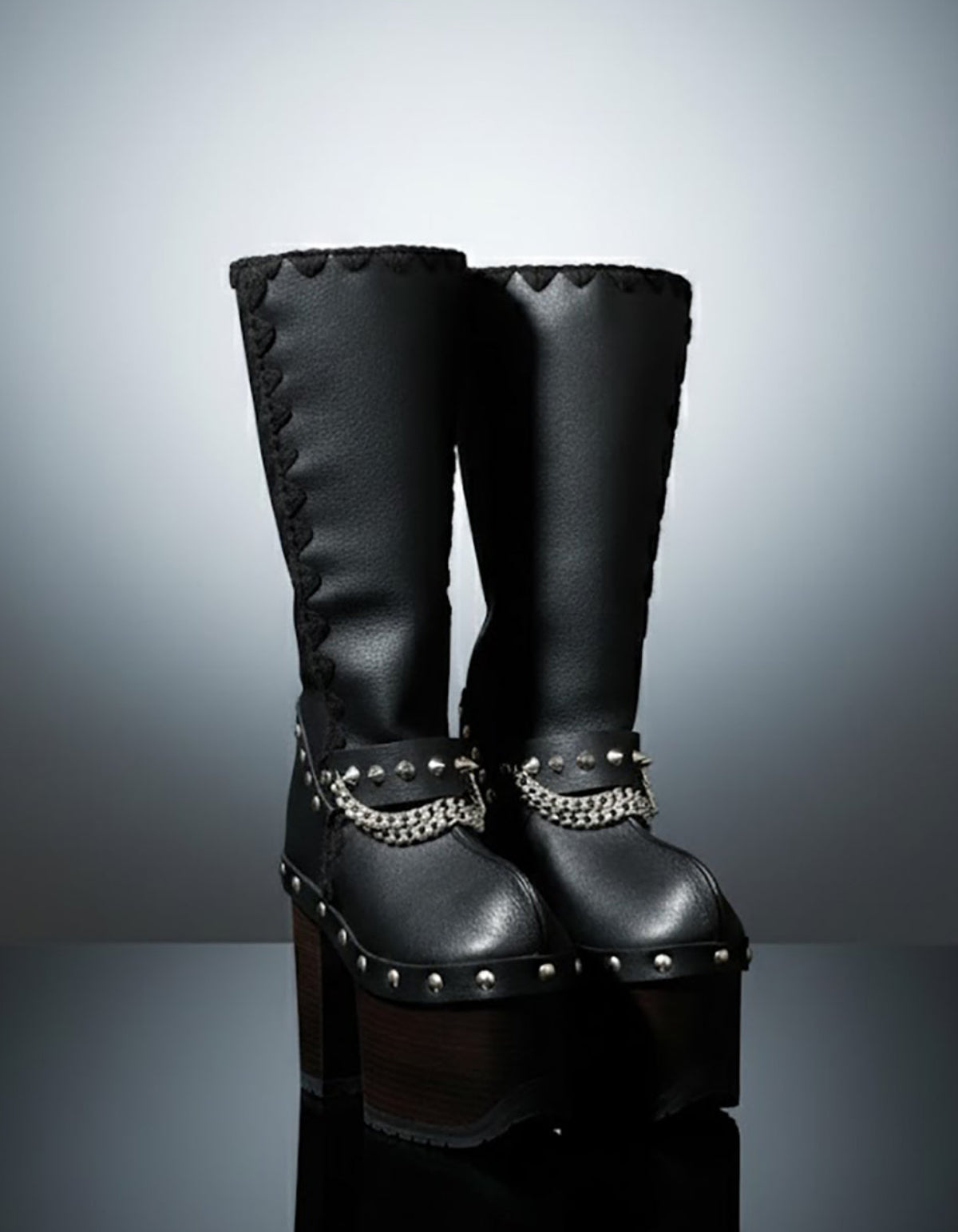 Handmade leather platform boots with silver pyramid studs, chains and 15 cm wenge wooden heel by Sol Caleyo