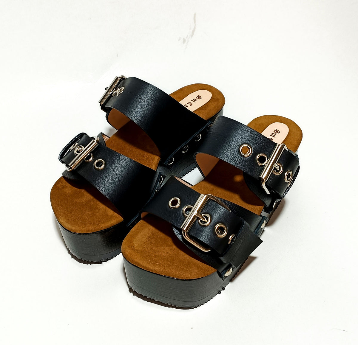 Handmade black leather buckle wedge sandals with silver studs and 6 cm wenge wooden wedge by Sol Caleyo.