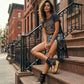 Black handmade leather flip flop wedge boots with crochet trim, old-gold pyramid studs and 10 cm wooden wedge by Sol Caleyo.