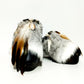 Handmade smooth black leather closed-toe platform mule clogs with chinchilla rabbit fur, feathers, bone, carved horn, shells and 6 cm wenge lacquered wooden heel by Sol Caleyo.