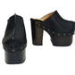 Black leather clogs with platform and super high heel. Leather mule with super high wooden heel. Black leather clogs 70's vintage style. Vintage style super high heel clogs. Sizes 34 to 47. High quality leather shoes handmade by sol Caleyo. Sustainable fashion.