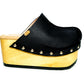 Handmade black leather open-back wedge mule clogs with silver studs and 9 cm wooden wedge by Sol Caleyo.