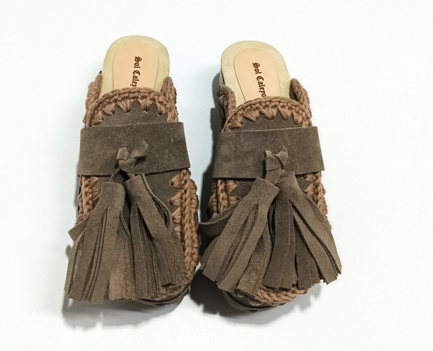 Sol Caleyo Artemisa Earth Tone Suede Tassel Clogs side view on white background