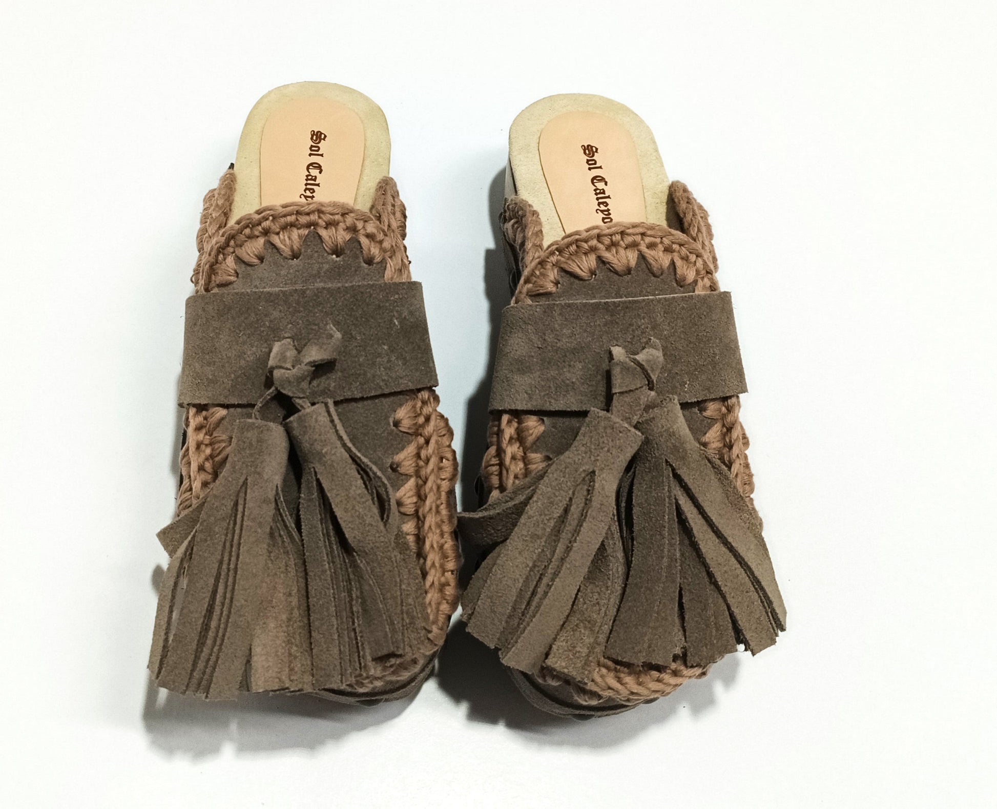 Sol Caleyo Artemisa Earth Tone Suede Tassel Clogs side view on white background