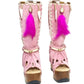 Close-up of Rhapsody Bohemia Pink Boots in premium pink suede with fringe, hand-selected feathers, and organic shells. These artisanal boho boots by Sol Caleyo feature a high hand-sculpted wooden heel and platform.