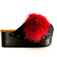 Handmade black leather open-back wedge mule clogs with bordeaux fur panels, gold studs and 6 cm wooden wedge by Sol Caleyo.