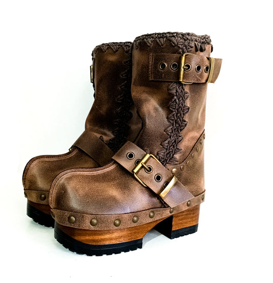Handmade brown distressed leather mid-calf platform boots with old-gold buckles, rivets and 6.5 cm natural lacquered wooden heel by Sol Caleyo.