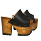 Handmade dark brown platform mules with a wide instep strap and open toe, made in Spain