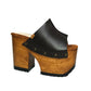 Lacquered wooden heel and 9 cm platform of handmade brown leather mule sandals