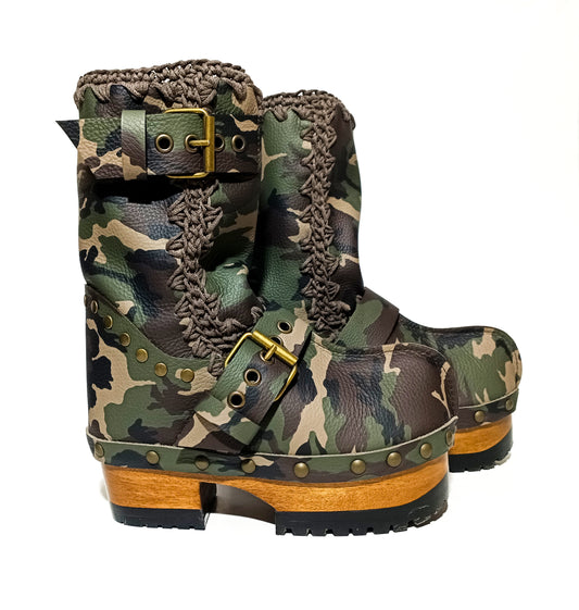 Handmade military green and brown camo print leather mid-calf platform boots with antique gold buckles and 6.5 cm lacquered wooden heel by Sol Caleyo.