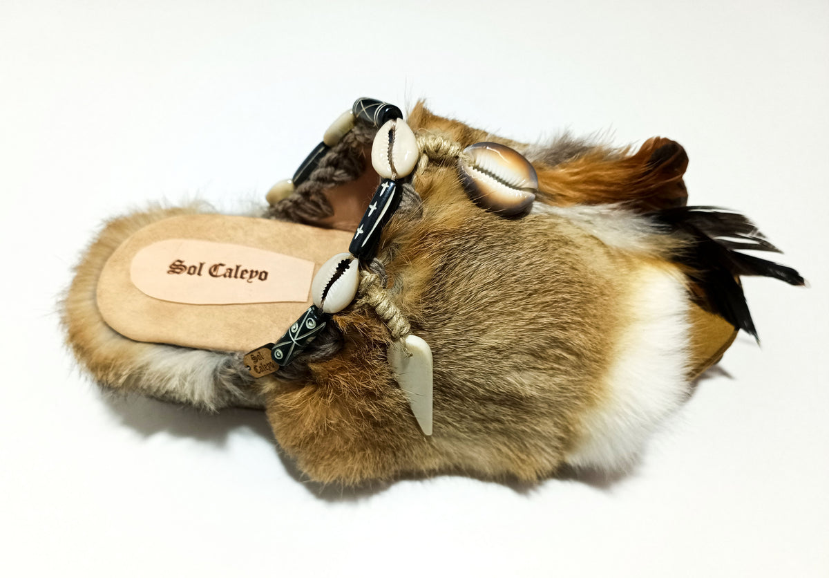 Handmade boho suede platform clogs with rabbit fur, carved bone, shells and feathers by Sol Caleyo