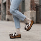 Cowhide leather clogs with wooden wedge, Vintage 70's style clogs. Leather clogs with wooden wedge. High quality footwear handmade by Sol Caleyo.