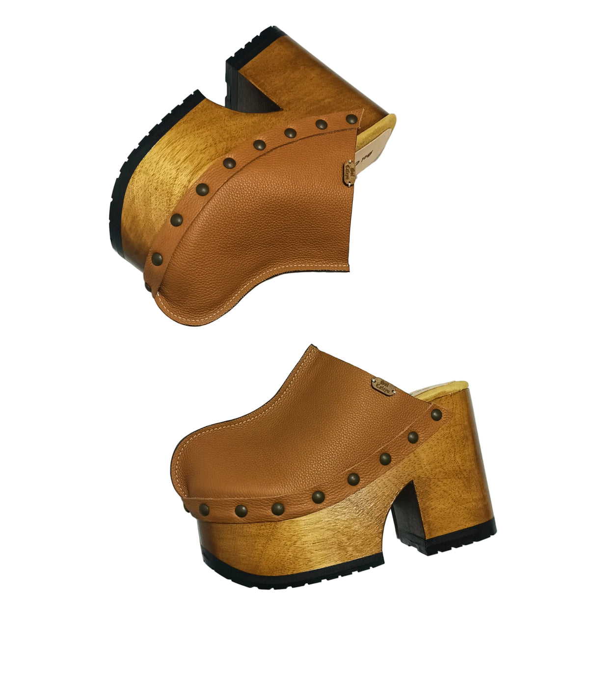Brown leather clogs in a vintage 70s style. Super high vintage-style wooden heel. Sizes 33 to 47. High-end footwear handmade by Sol Caleyo.