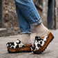 Cowhide leather clogs with wooden wedge, Vintage 70's style clogs. Leather clogs with wooden wedge. High quality footwear handmade by Sol Caleyo.