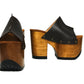 Smooth dark brown leather strap with antique-gold studs on handmade platform mule sandals