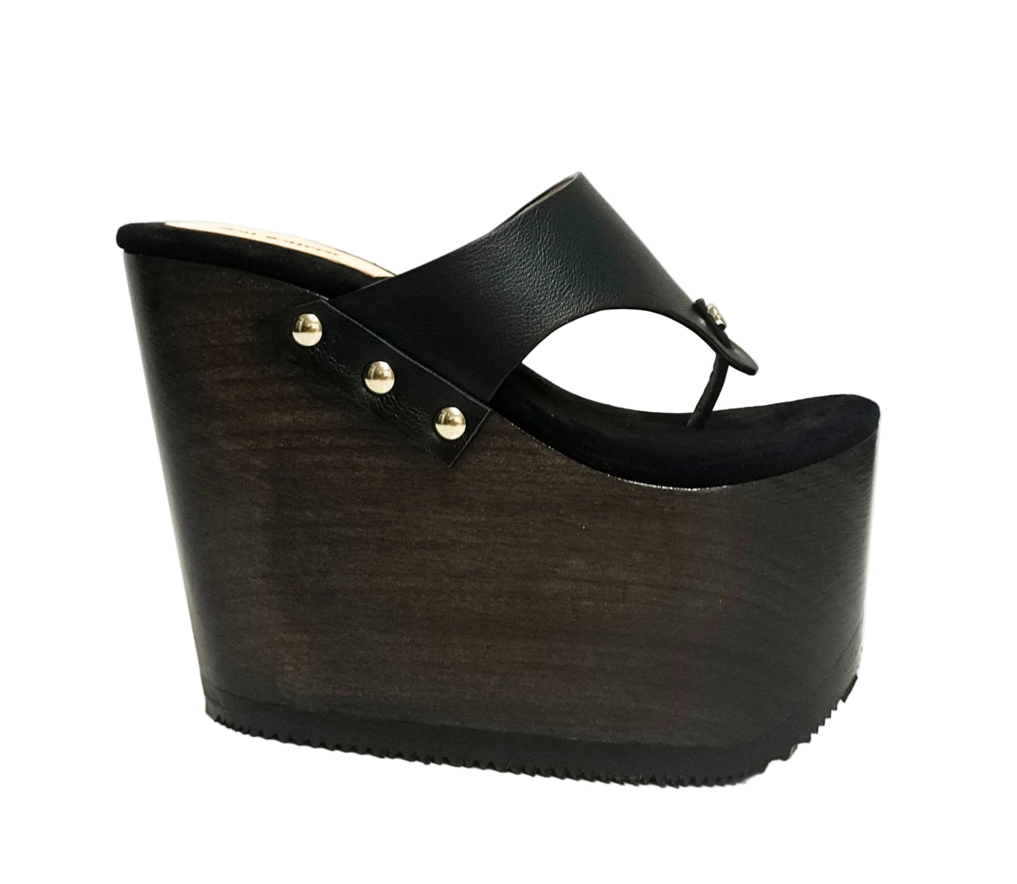 Pair of Sol Caleyo Kauai XL handcrafted flip flop sandals featuring black genuine leather straps, silver studs, and a high wengue-colored wooden platform sole.