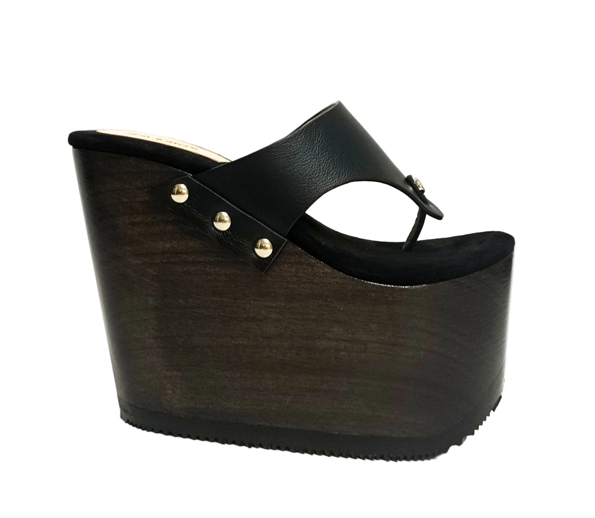 Pair of Sol Caleyo Kauai XL handcrafted flip flop sandals featuring black genuine leather straps, silver studs, and a high wengue-colored wooden platform sole.