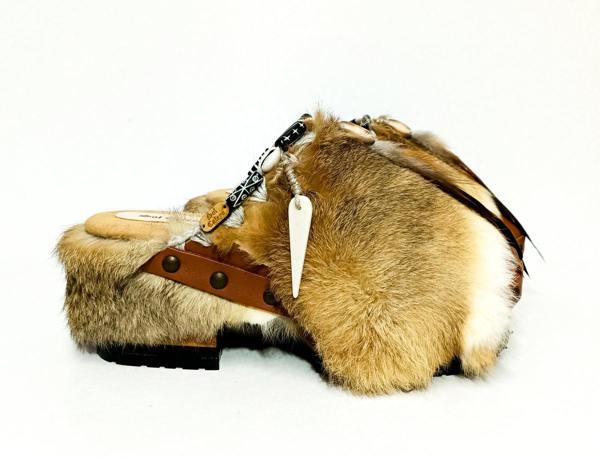 Handmade smooth camel leather closed-toe platform mule clogs with brown rabbit fur, feathers, bone, carved horn, shells and 6 cm natural lacquered wooden heel by Sol Caleyo.