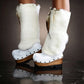 White fur boots with wooden wedge. White bohemian style leather boots. Handmade clogs shoes. White fur boots decorated with feathers, natural shells and horns. High-end handmade footwear by Sol Caleyo. Handmade Furry Shoes.