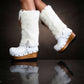 White fur boots with wooden wedge. White bohemian style leather boots. Handmade clogs shoes. White fur boots decorated with feathers, natural shells and horns. High-end handmade footwear by Sol Caleyo. Handmade Furry Shoes.