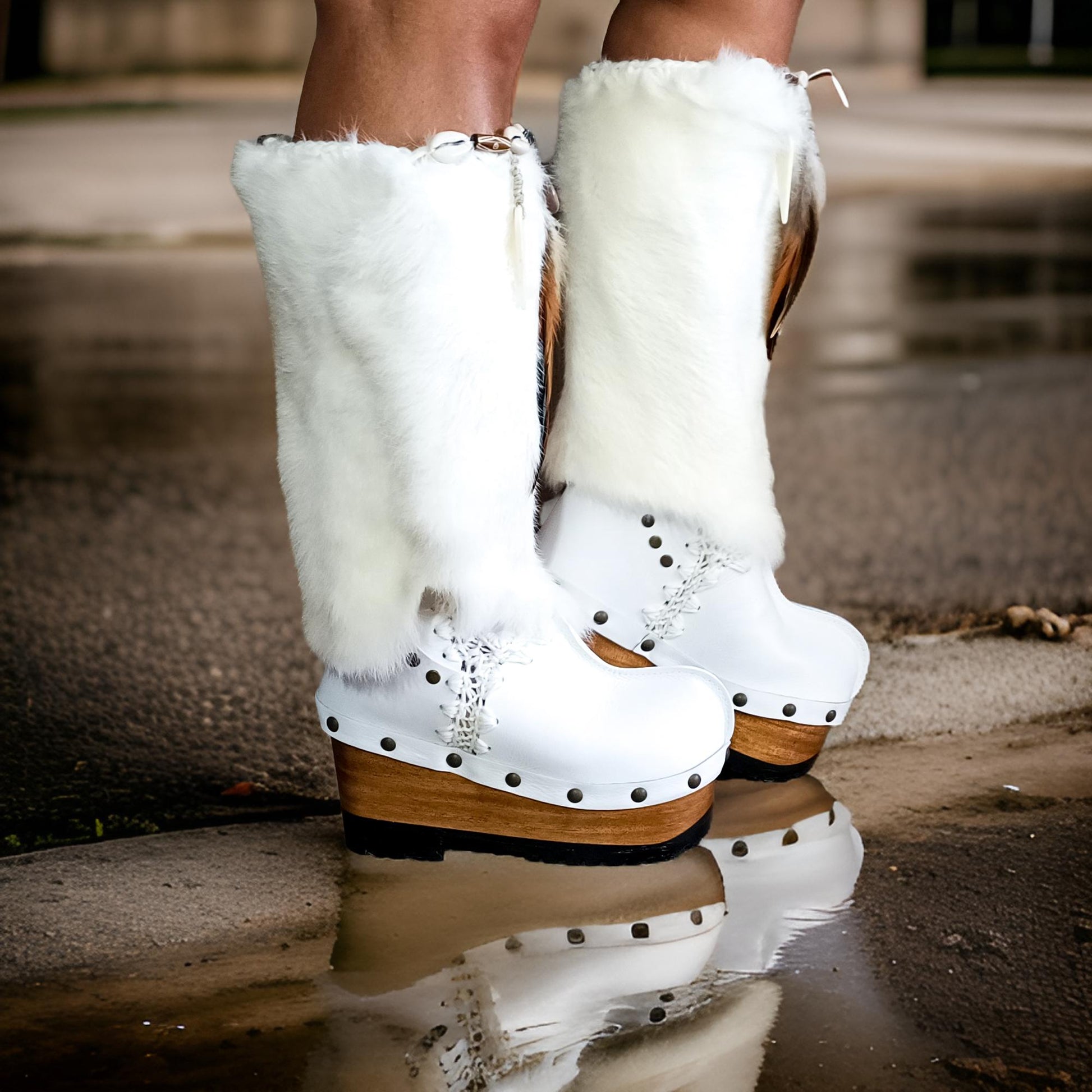 White fur boots with wooden wedge. White bohemian style leather boots. Handmade clogs shoes. White fur boots decorated with feathers, natural shells and horns. High-end handmade footwear by Sol Caleyo. Handmade Furry Shoes.