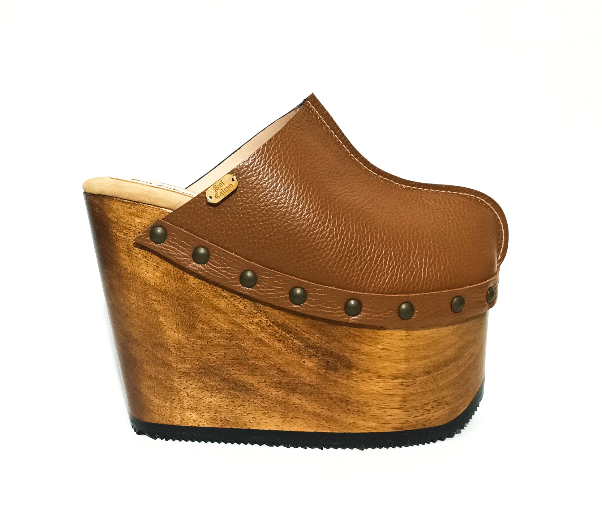 Vintage inspired, 70s style platform clogs with super high heels. Super high wooden wedge made in closed leather. Size from 34 to 47. Handmade to order. The Chicago Clogs are an exclusive design by Sol Caleyo.