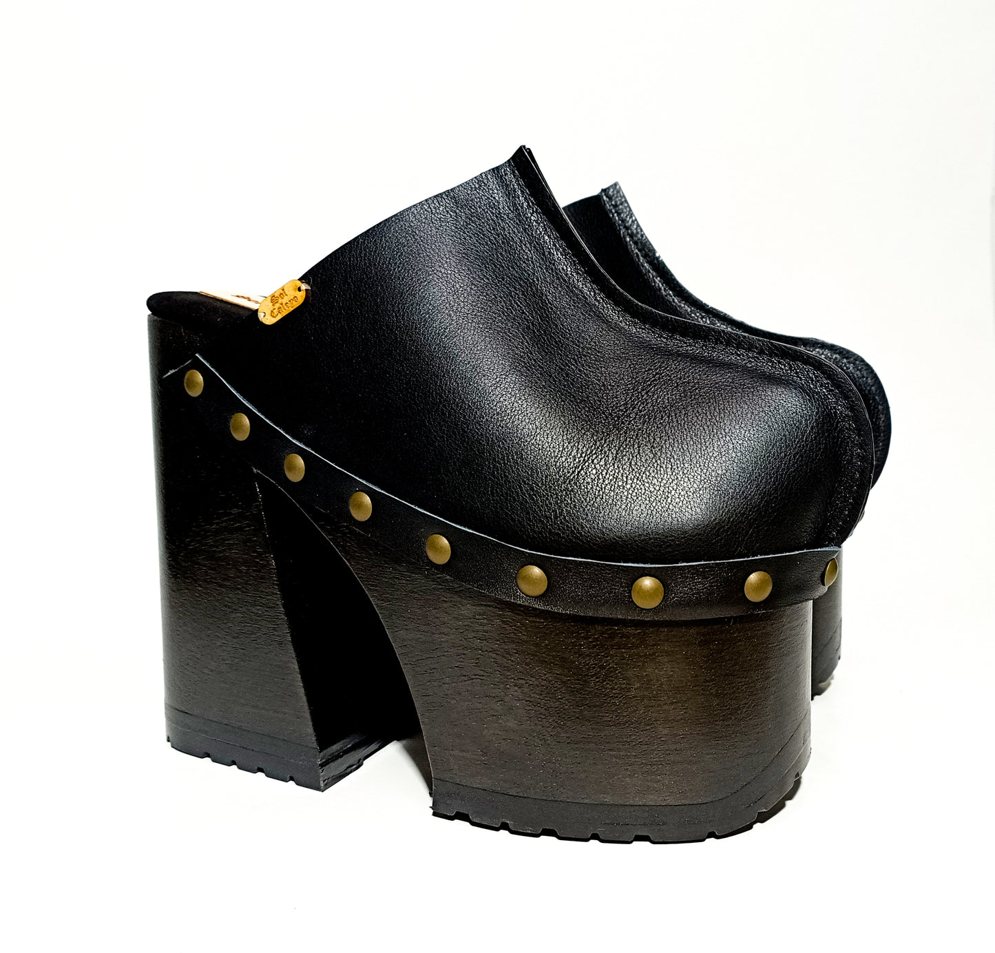 Vintage 70s style platform clogs, with super high heel, made in black leather. Sizes 34 to 47, handmade. Reserve yours now! Show an authentic vintage style!