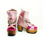 Metallic pink leather platform  booties. Platform sandals with wooden heel. Pink boots with studs and silver chains. High-end footwear handmade by Sol Caleyo.