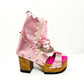 Metallic pink leather platform  booties. Platform sandals with wooden heel. Pink boots with studs and silver chains. High-end footwear handmade by Sol Caleyo.