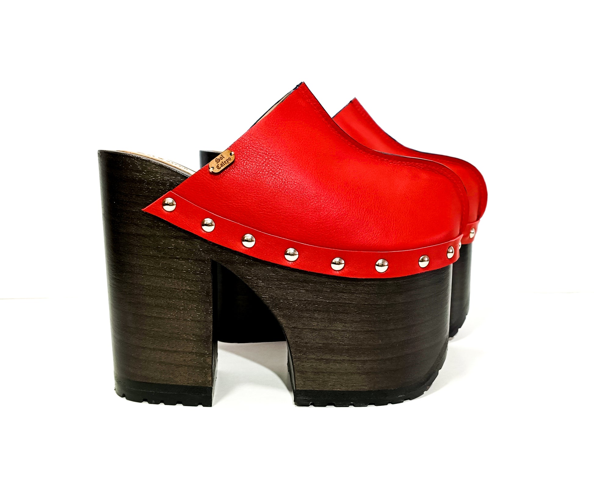 Red leather clog with super high wooden heel in vintage 70s style. Leather clog with platform and super high heel made in wood. Sizes 34 to 47. High quality leather shoes handmade by Sol Caleyo.