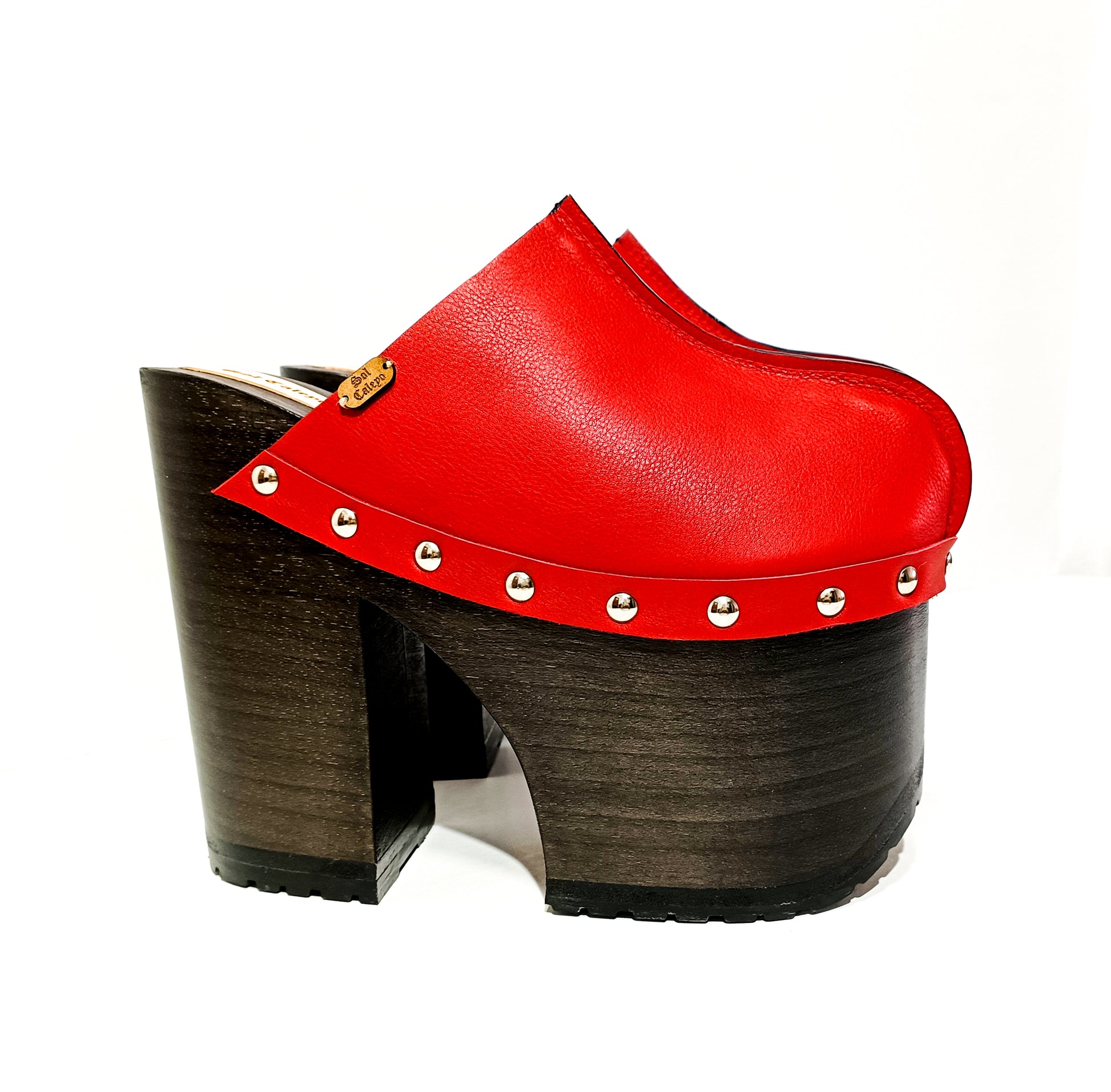 Red leather clog with super high wooden heel in vintage 70s style. Leather clog with platform and super high heel made in wood. Sizes 34 to 47. High quality leather shoes handmade by Sol Caleyo.