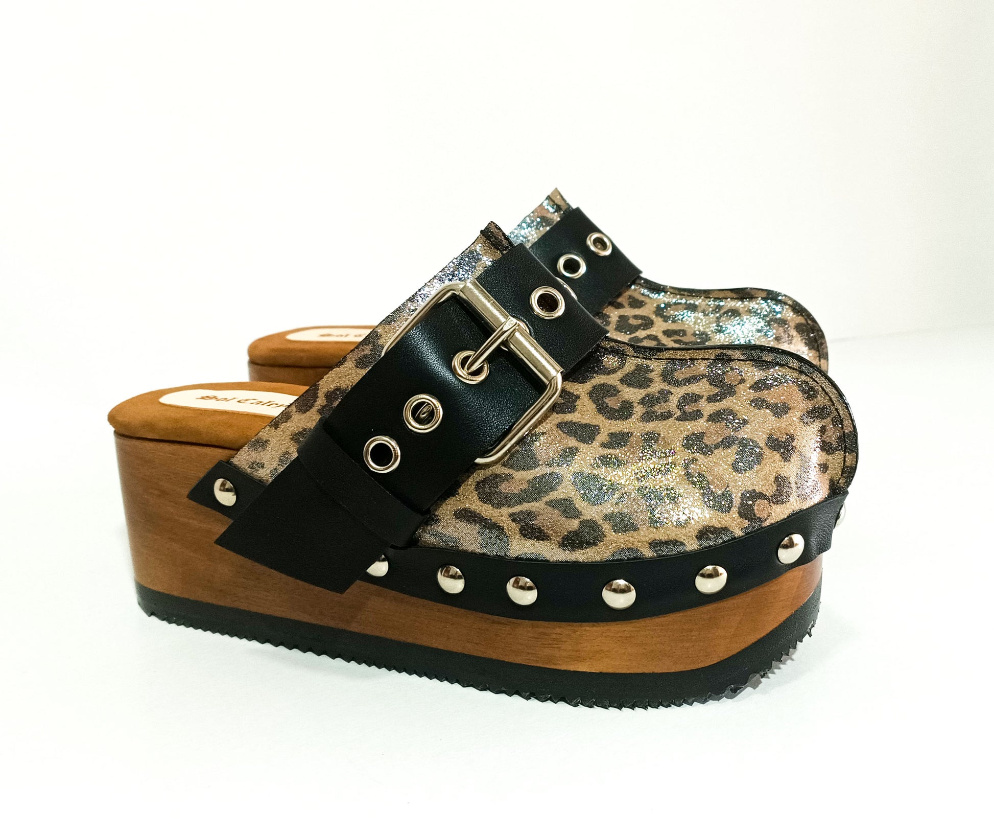 Wooden wedge clogs in leopard leather, Vintage style wooden wedge clogs. Handmade leather clogs. High-end handmade footwear by Sol Caleyo.