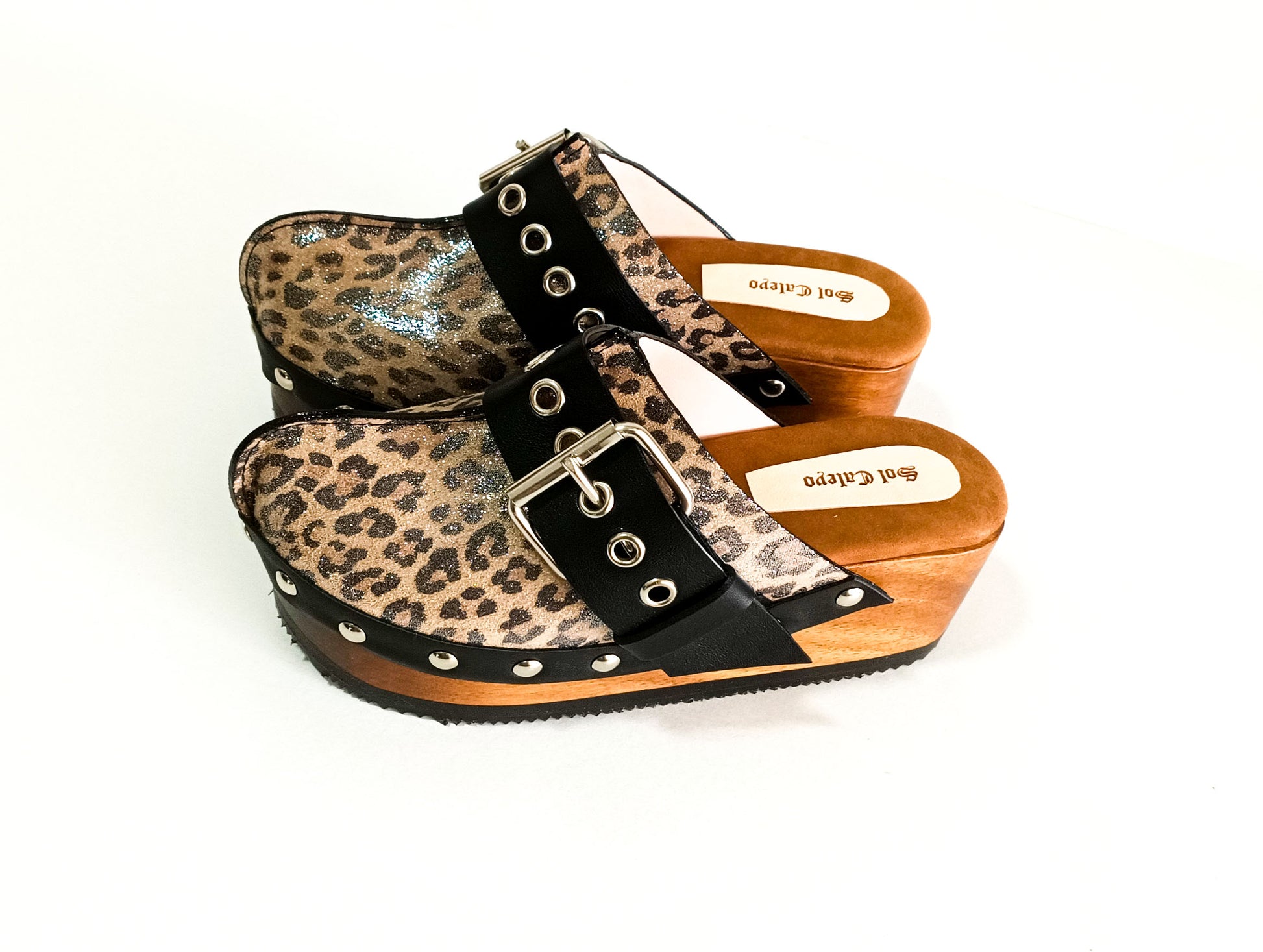 Wooden wedge clogs in leopard leather, Vintage style wooden wedge clogs. Handmade leather clogs. High-end handmade footwear by Sol Caleyo.