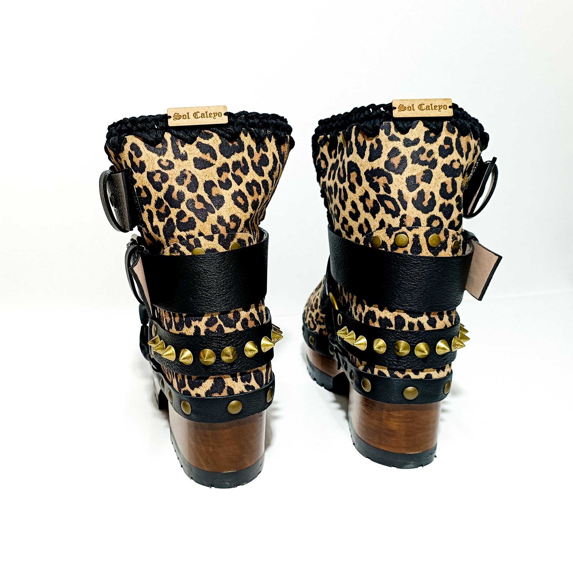 Leopard ankle boots with biker style buckles. Biker style ankle boots. Handmade leather ankle boots. High-end handmade shoes made to order.