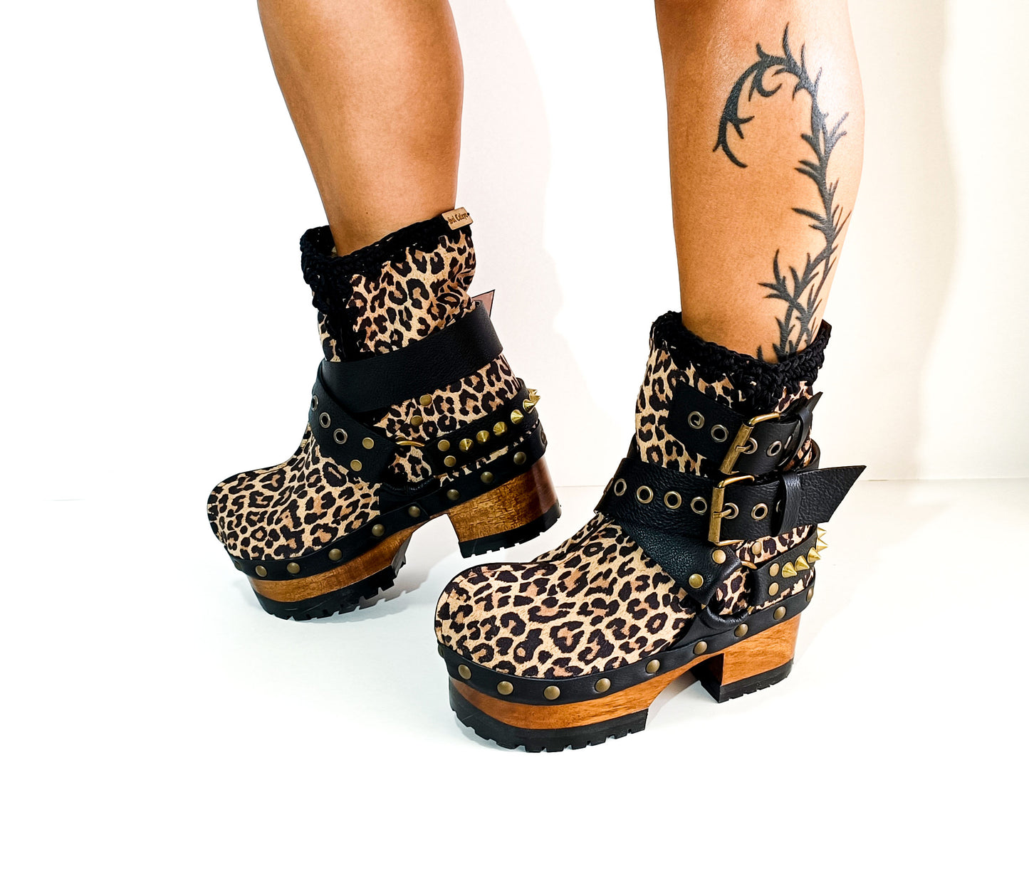 Leopard ankle boots with biker style buckles. Biker style ankle boots. Handmade leather ankle boots. High-end handmade shoes made to order.