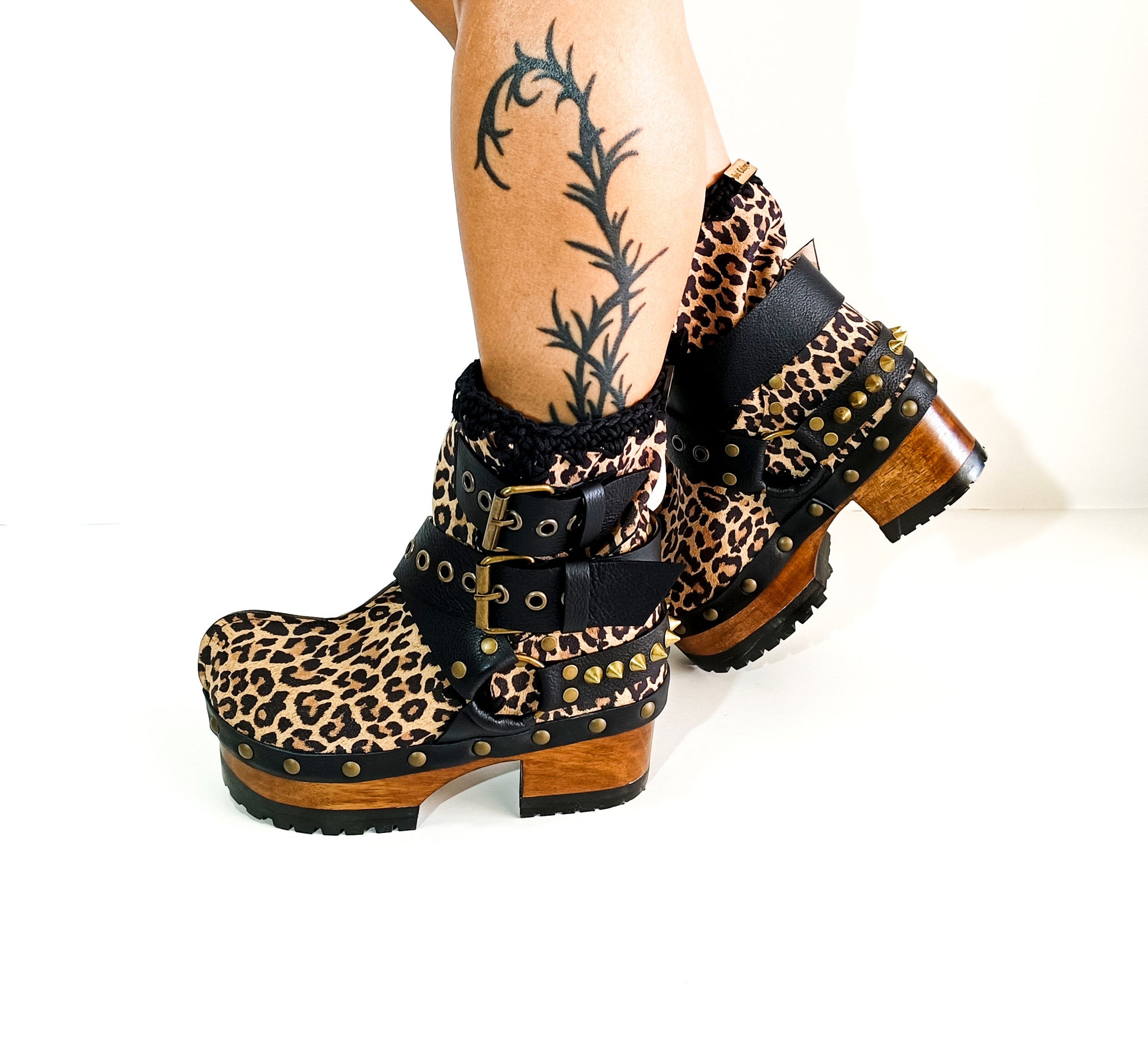 Leopard ankle boots with biker style buckles. Biker style ankle boots. Handmade leather ankle boots. High-end handmade shoes made to order.